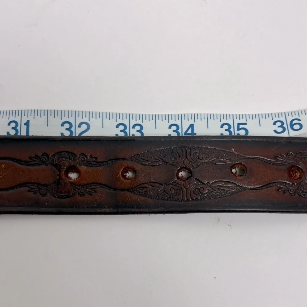 Brown tooled leather belt, unisex, approximately 34” see measurements in photos.